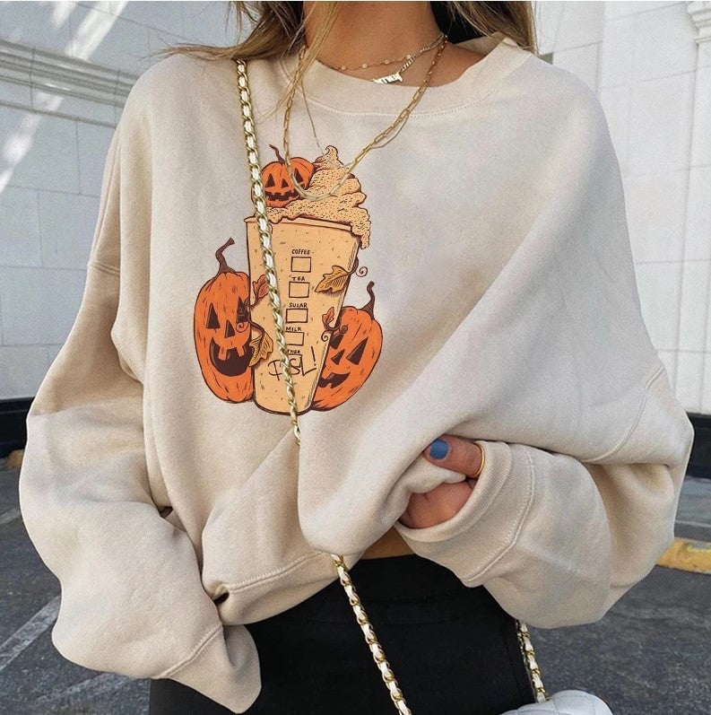 Suéter. Sudadera con cuello redondo y estampado de Halloween para mujer