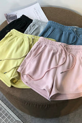 Pantalones cortos sueltos de verano para mujer con cintura alta.