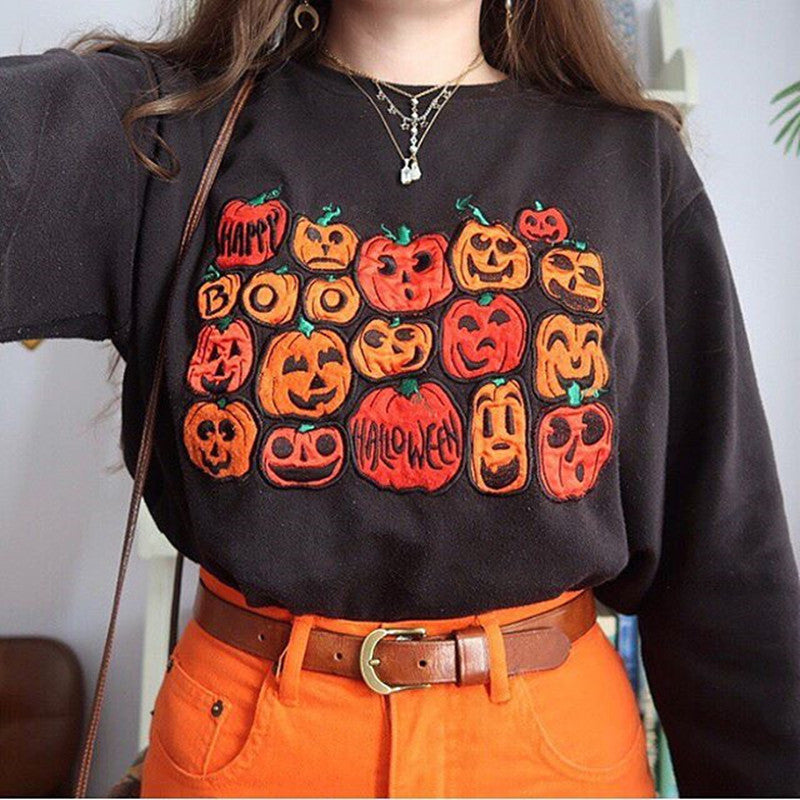 Suéter. Sudadera con cuello redondo y estampado de Halloween para mujer