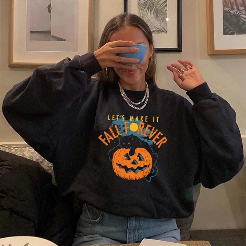 Suéter. Sudadera con cuello redondo y estampado de Halloween para mujer